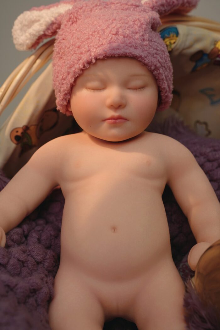 Realistic silicone reborn doll with lifelike features and soft skin. Perfect for collectors and doll.