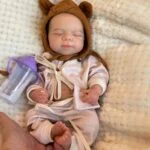 Reborn doll, 13 inch companion toy, realistic baby doll for collectors and children.