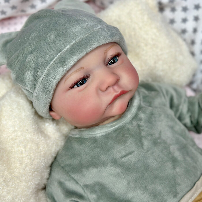 Reborn baby doll with open eyes, 18 inches, realistic vinyl, perfect for collectors and children.