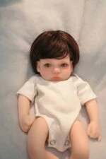 Reborn silicone doll with lifelike features, perfect for collectors and enthusiasts.