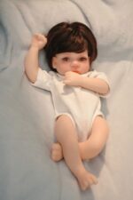 High-quality silicone reborn doll with lifelike features and soft skin. Perfect for collectors and c.