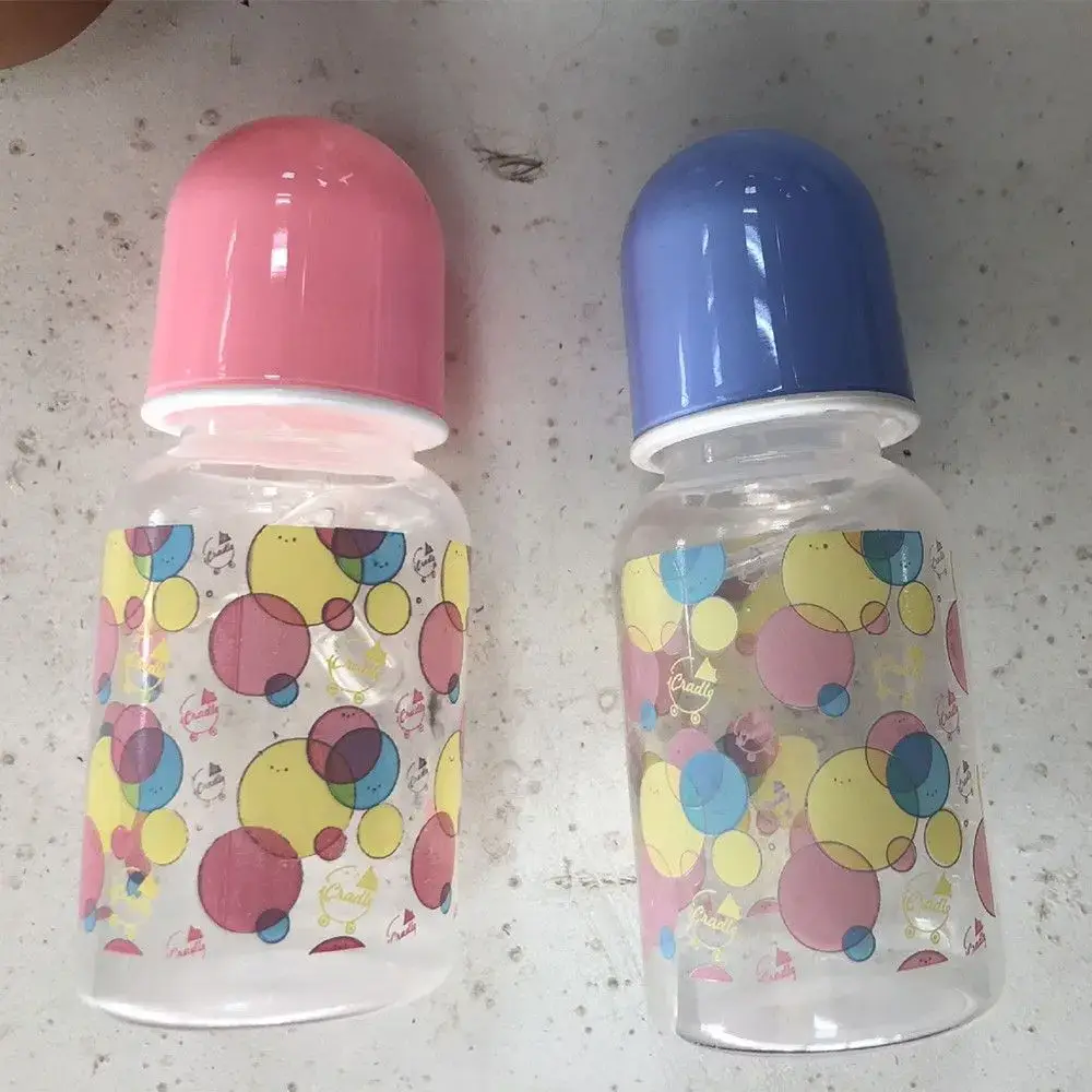 Chupetes para muñecas reborn con clips magnéticos, en rosa y azul, perfectos como accesorios para muñecas realistas.