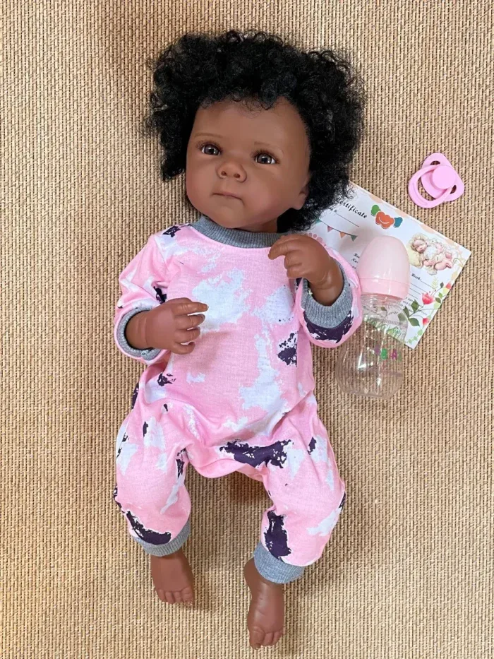 Realistic 18-inch dark skin silicone vinyl baby doll for children and collectors.