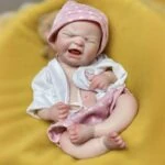 Poupée reborn en silicone de 33 cm (13 pouces) qui pleure, avec des traits réalistes et une peau douce. Parfaite pour les collectionneurs.