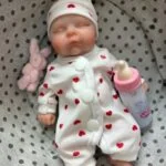 Reborn doll with realistic 3D painted features, 20cm size, perfect for collectors and children.
