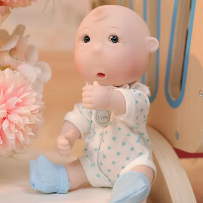 Mini genfødt babydukke til børn og samlere.