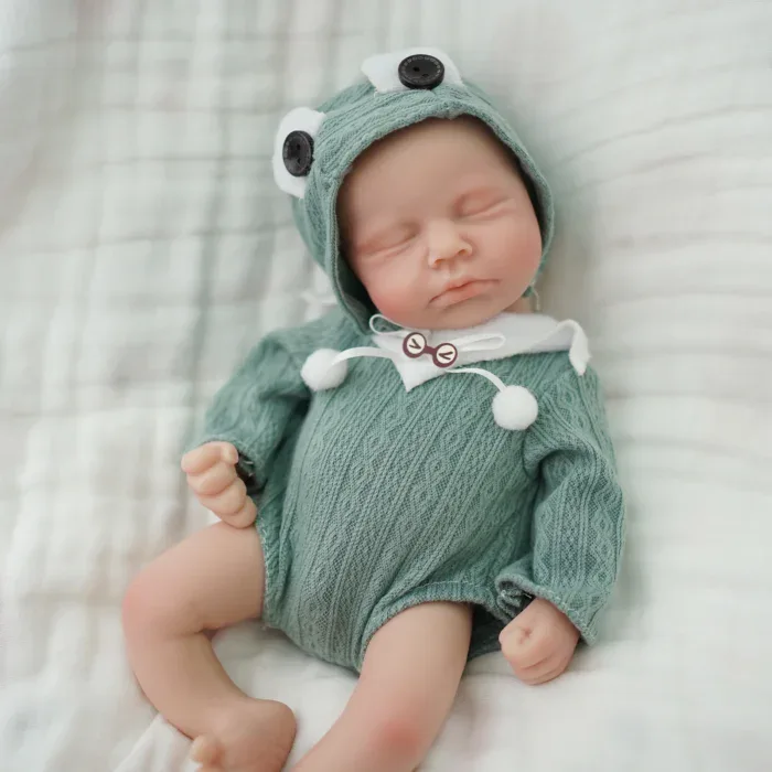 Adorable poupée reborn en silicone de 30 cm (12 pouces) vêtue d'une tenue sur le thème de la grenouille, pour les collectionneurs.