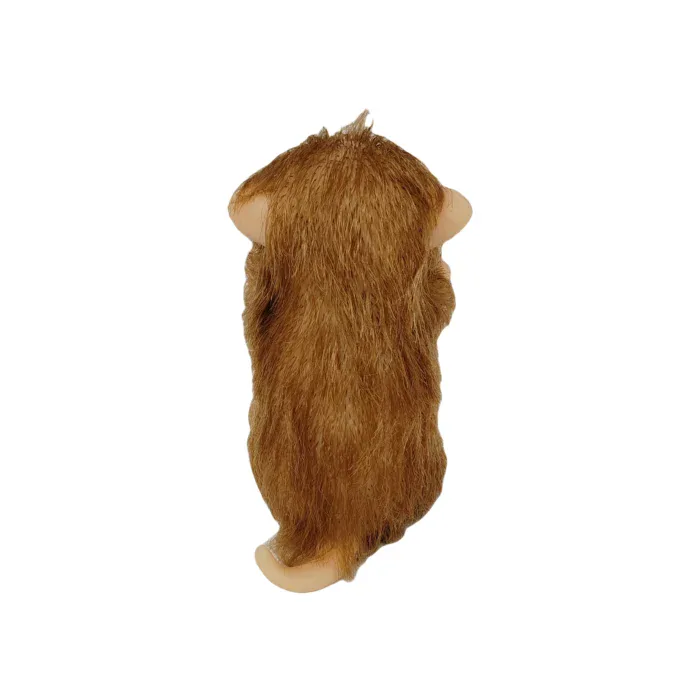 Palm-sized silicone puppy doll with brown fur and soft features.