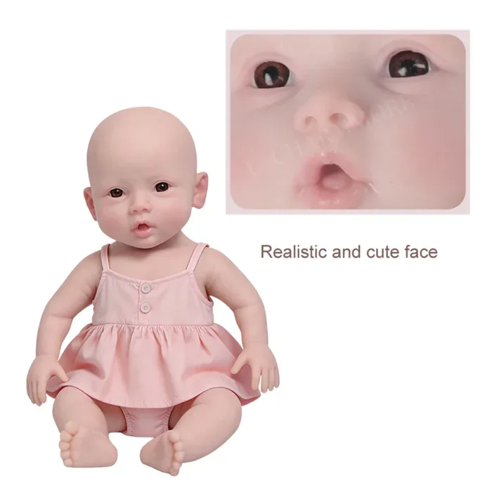 Poupée réaliste pour collectionneurs, avec un visage adorable et une robe rose.
