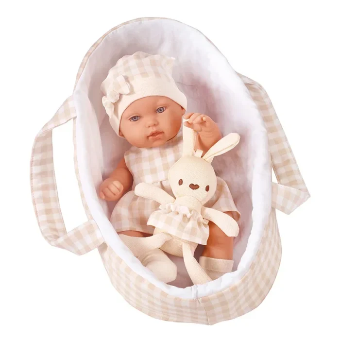 Adorable 14-inch baby girl reborn doll in a basket with plush bunny toy.