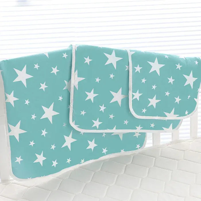 Doll changing mat with star pattern, padded cotton, 35x45 cm.
