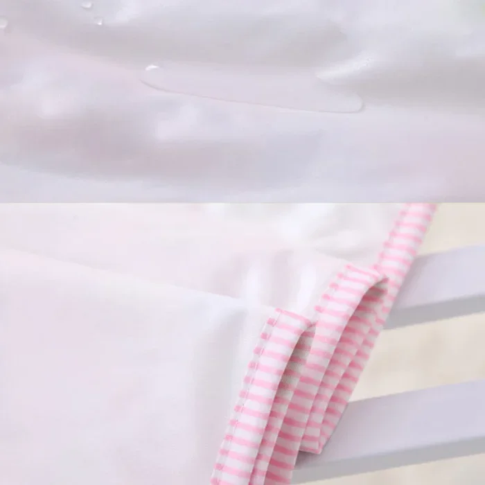 Soft padded cotton doll changing mat with pink striped border for baby dolls.
