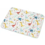 Colorful dinosaur print padded doll changing mat for play and comfort.