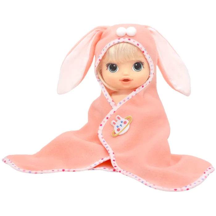 Baby doll in pink bunny hooded blanket with cute bunny face and ears.