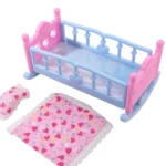 Colorful baby doll cradle with pink and blue design for role play.
