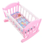 Pink and white doll cradle with moon and cloud design for kids.