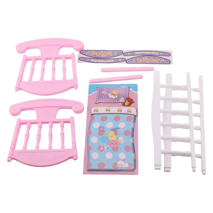 Pink and white baby doll cradle set with bedding and accessories for role play.
