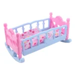Colorful baby doll cradle with pink and blue accents for role play.
