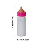 Mini baby bottle for reborn dolls, 9.4cm tall, with pink cap and beige nipple.
