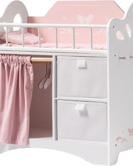 Pink and white wooden doll crib with storage drawers and bedding for 20 inch dolls.