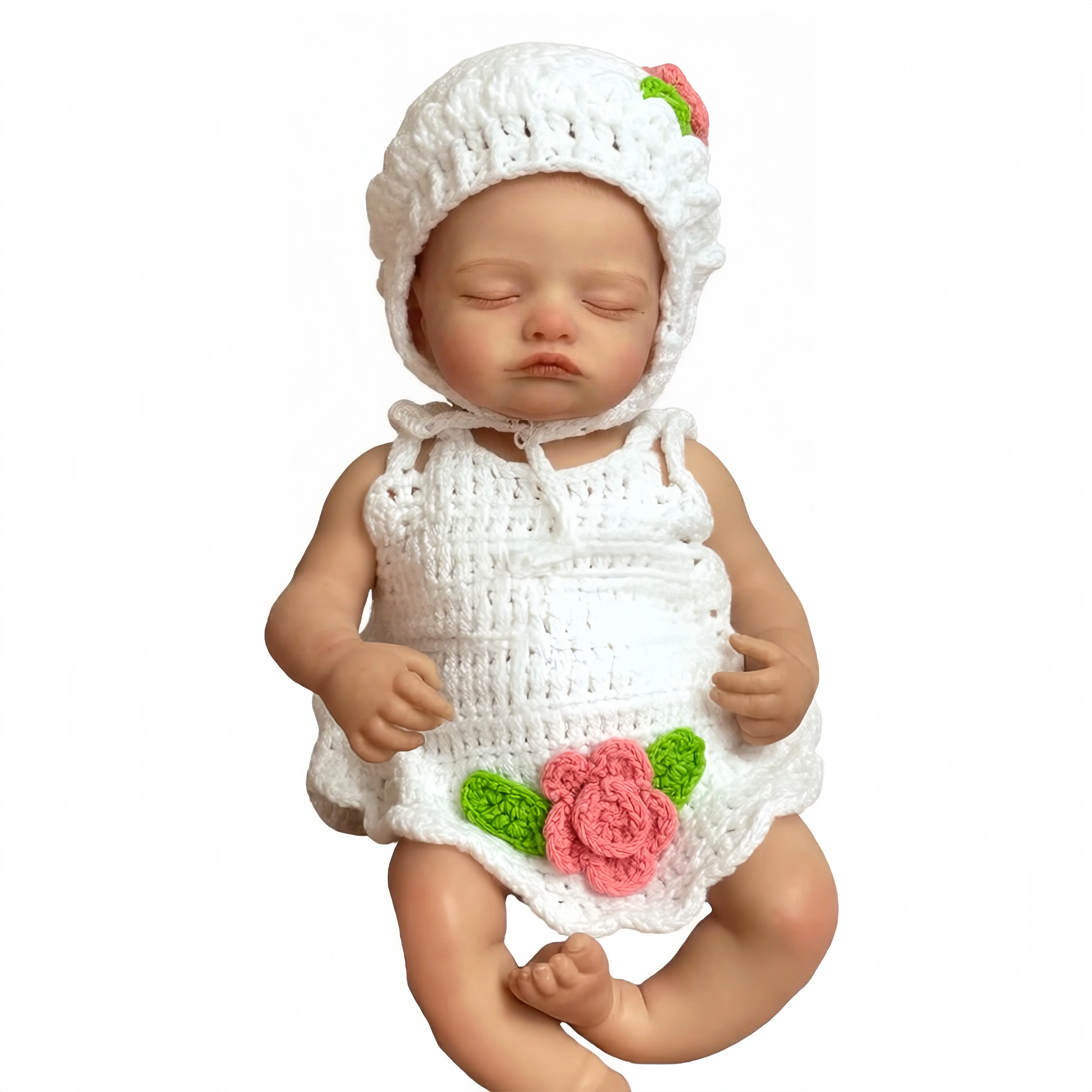Sleeping Baby Girl Reborn Doll Sleeping baby girl reborn doll in white crocheted outfit with pink rose.
